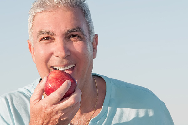 How Dental Implants Help You Enjoy Your Favorite Summer Foods!